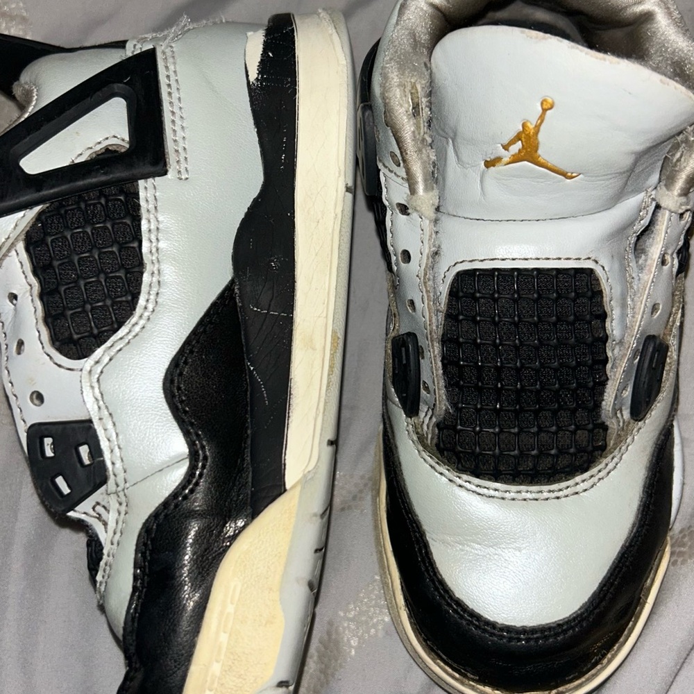 Jordan Kids Black and White Sneakers with Gold Accent